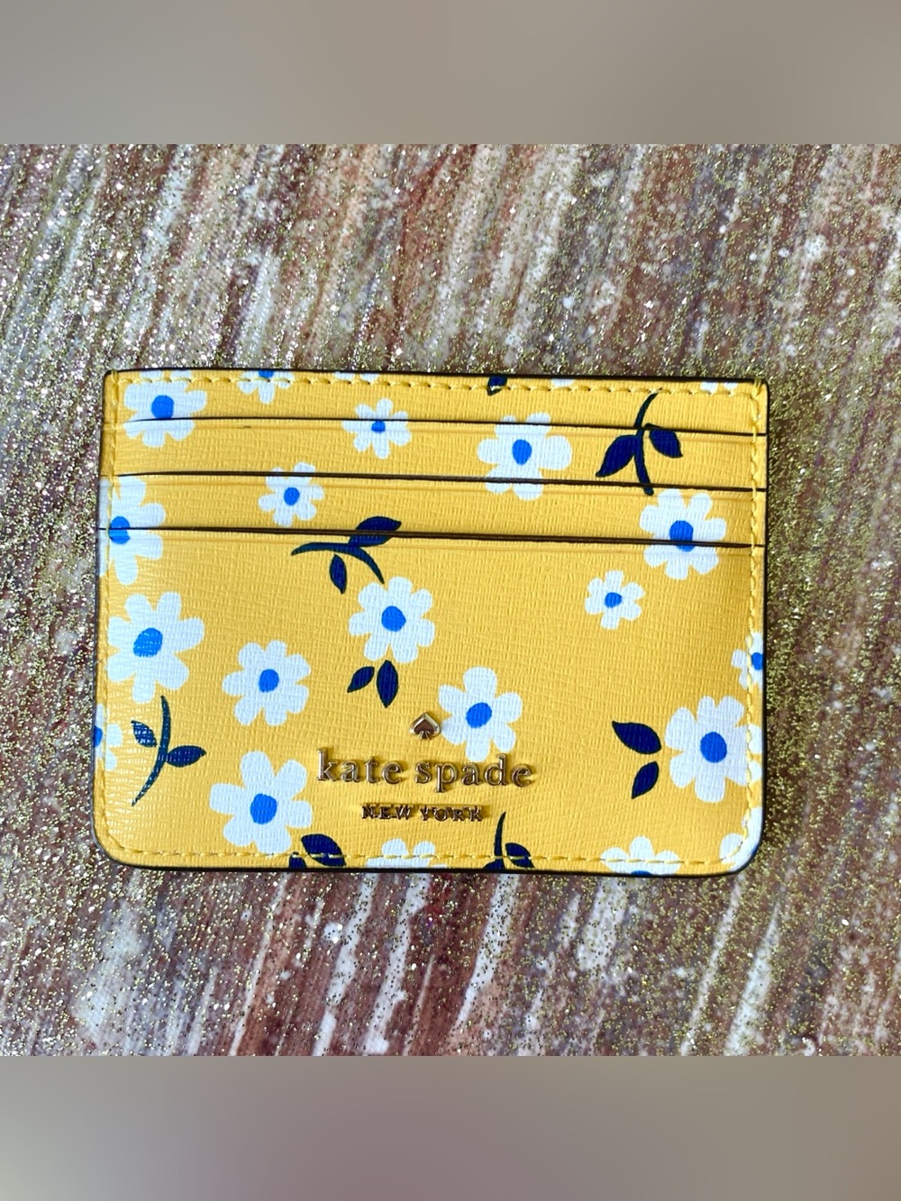 Kate Spade New York yellow card holder with white & blue floral print